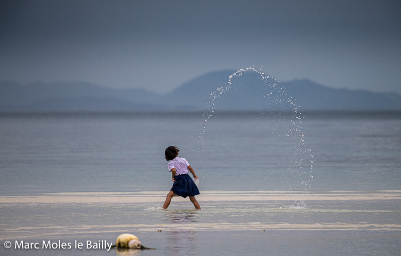 Photography by Marc Moles le Bailly - Asia - Young Lady Playing With Water